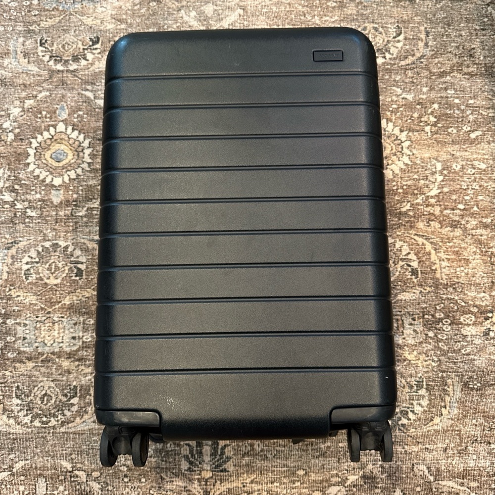 AWAY Black Hardshell Carry On Rolling Suitcase